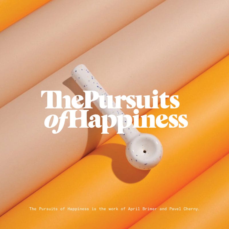 The pursuits of happiness logo over ceramic pipe image